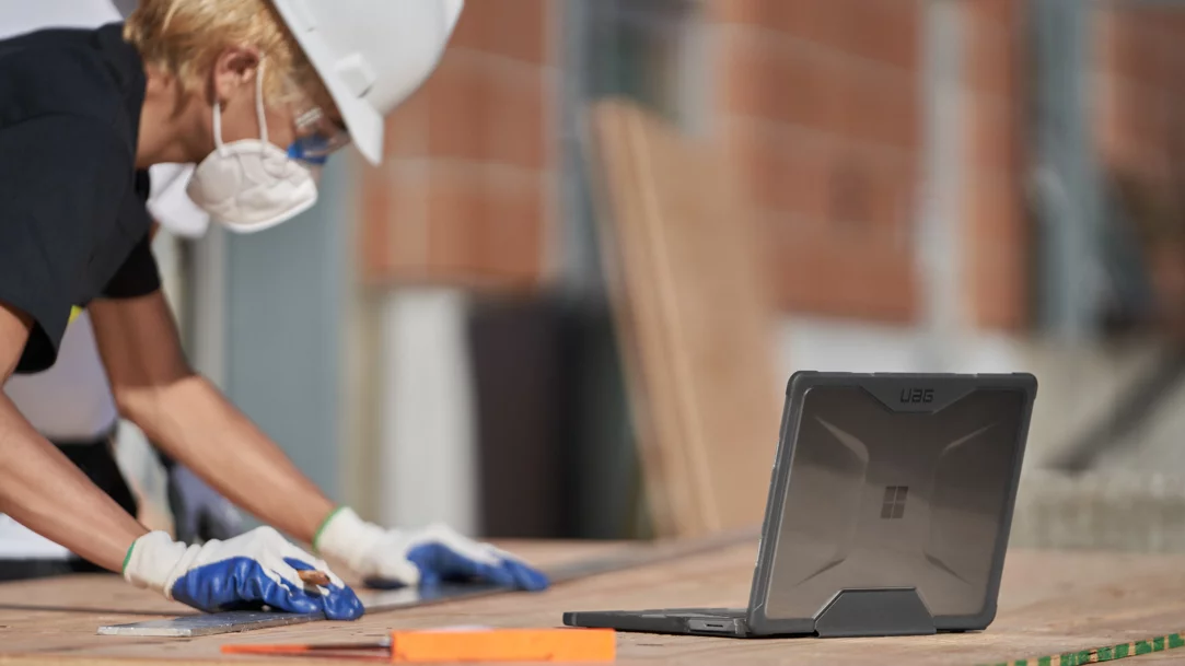 Where trades meet technology - hard hat and laptop